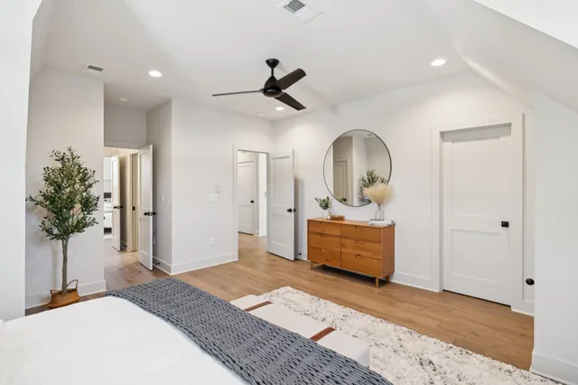 a en suite bathroom with a double vanity sink mirror and