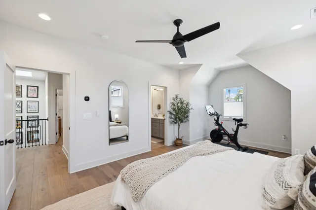 a view of a hallway with entryway and kitchen