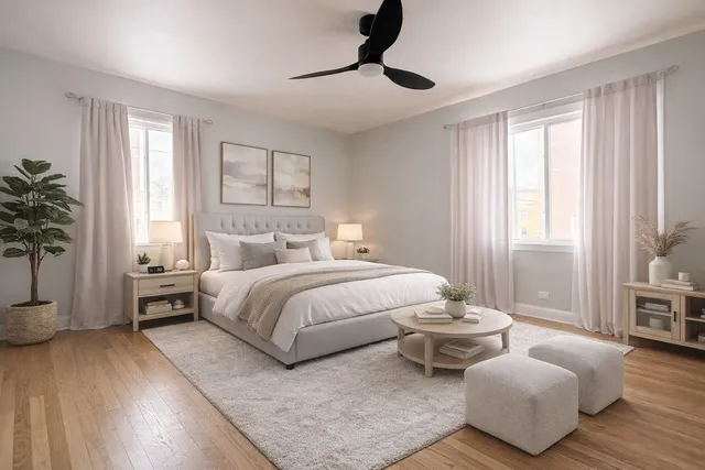 a bedroom with a bed and window