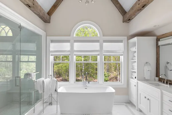 a bathroom with a bathtub and a sink