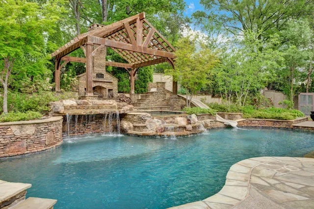 a view of a house with a yard porch and sitting area