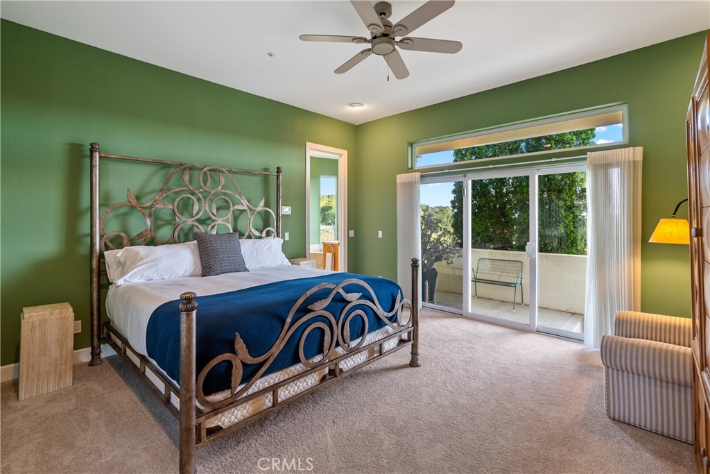 4342 Shadow Canyon Road Templeton, CA 93465 - Photo 28 of 74 a spacious bedroom with a bed and a large window