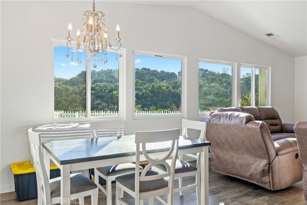4342 Shadow Canyon Road Templeton, CA 93465 - Photo 57 of 74 a living room with furniture and a chandelier