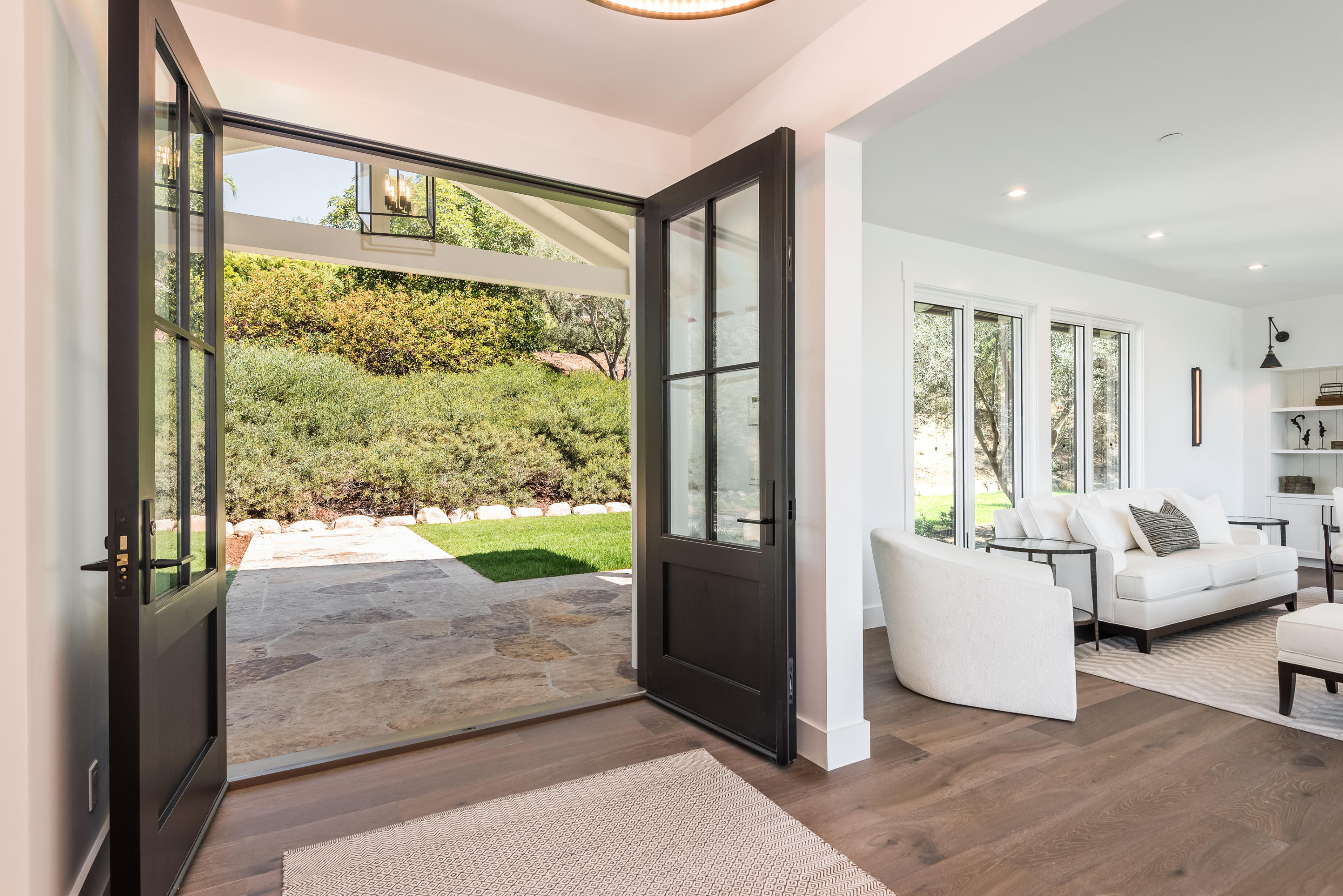 950 Brooktree Road Santa Barbara, CA 93108 - Photo 12 of 37 a living room with furniture and a large window