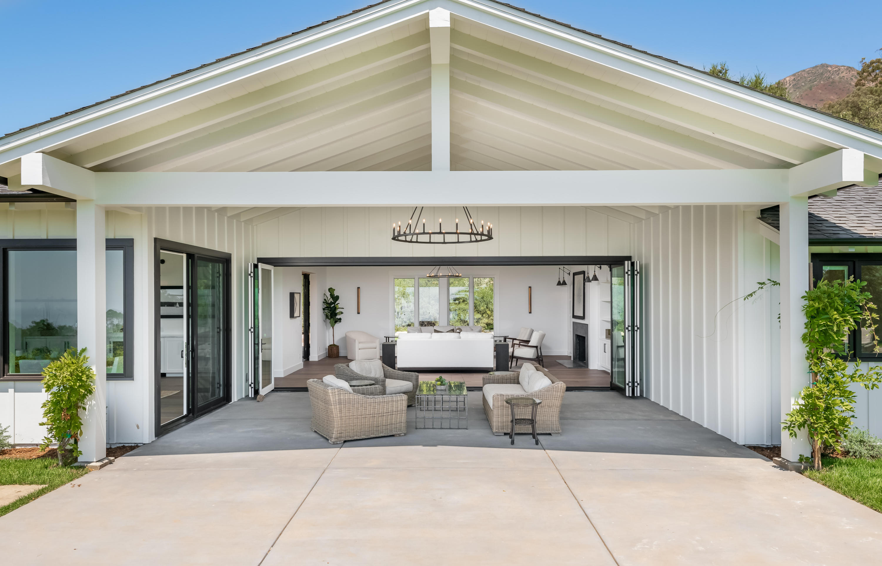 950 Brooktree Road Santa Barbara, CA 93108 - Photo 17 of 37 a view of a patio with table and chairs potted plants