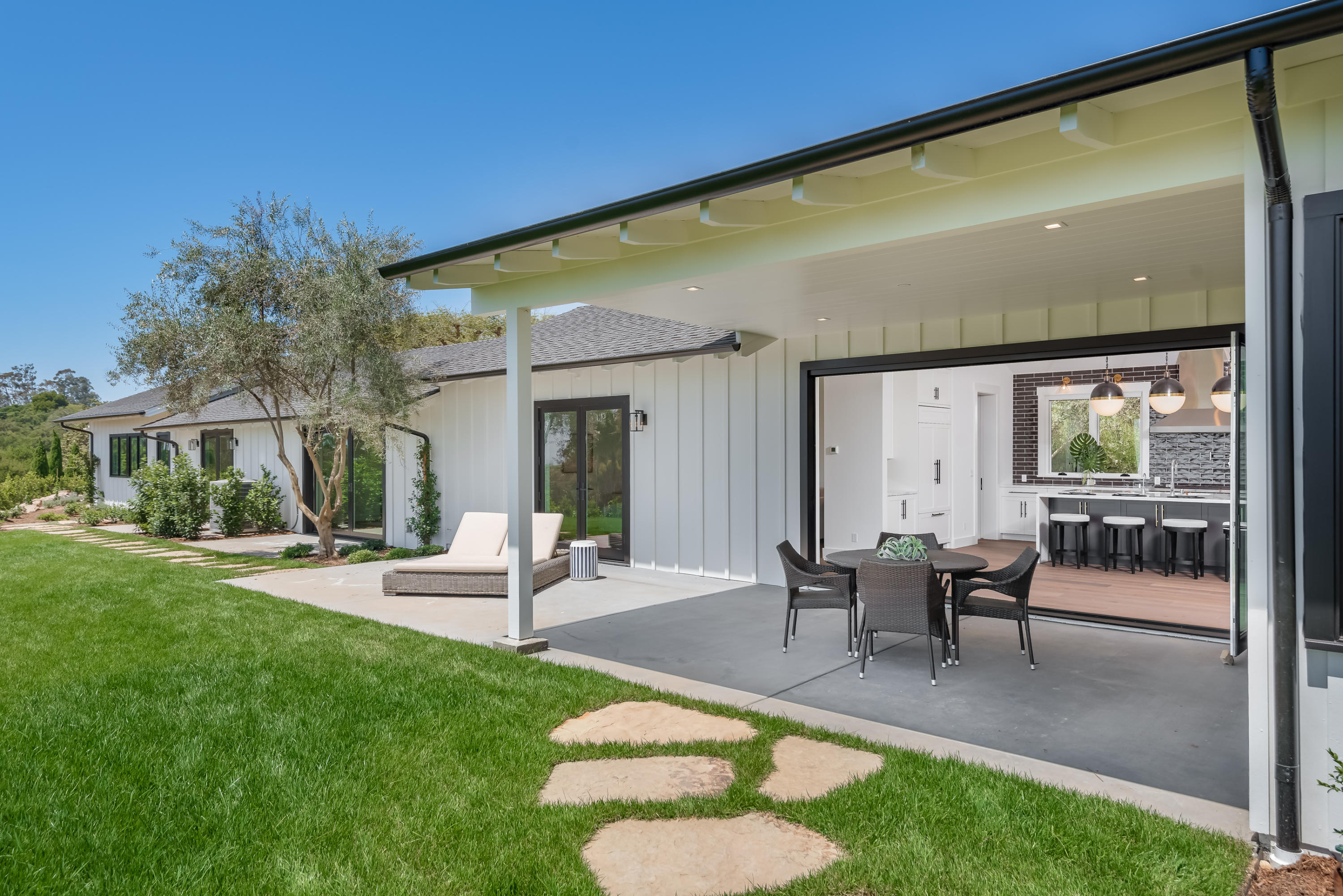 950 Brooktree Road Santa Barbara, CA 93108 - Photo 25 of 37 a swimming pool with outdoor seating and yard