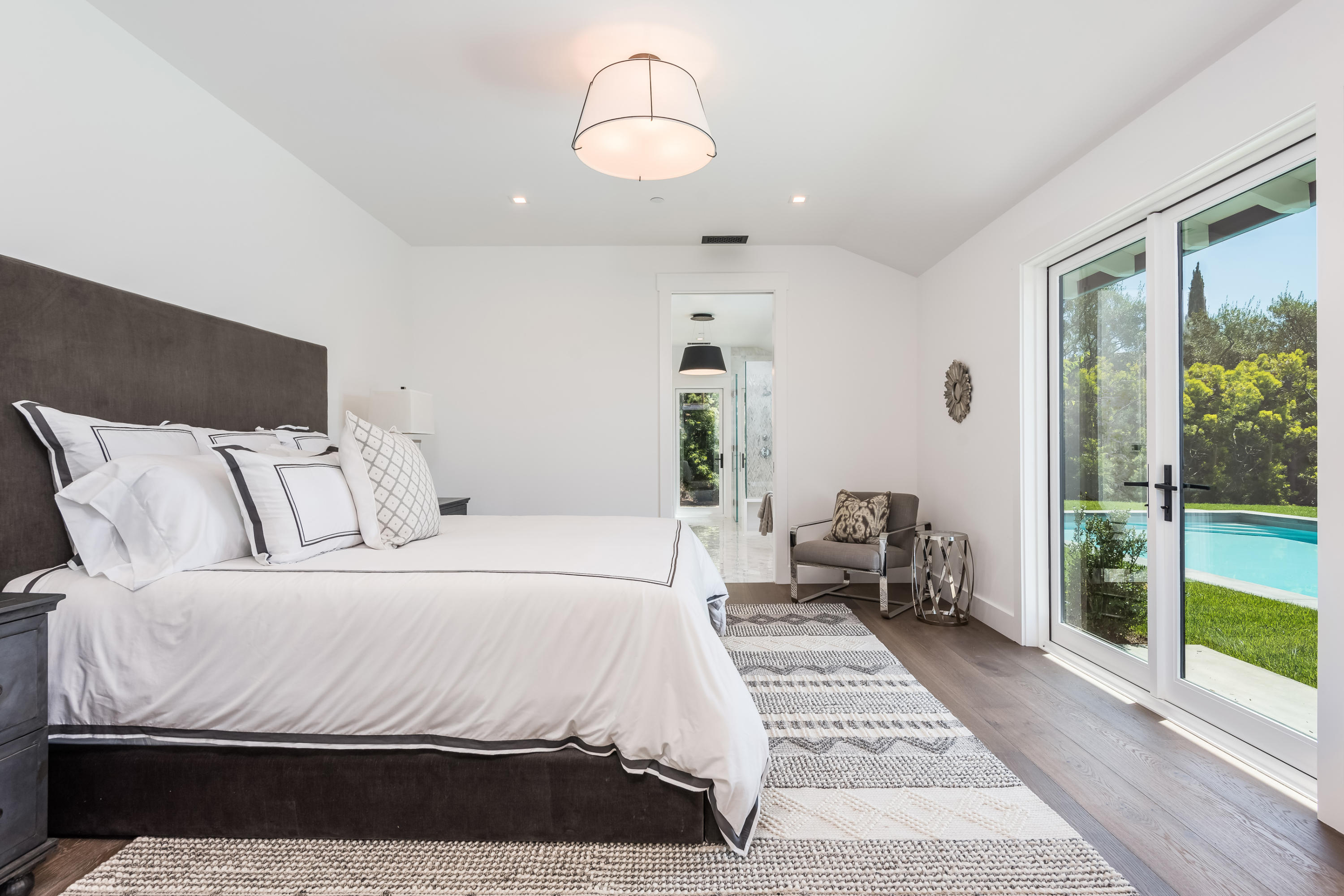 950 Brooktree Road Santa Barbara, CA 93108 - Photo 27 of 37 a bedroom with a large bed and a window