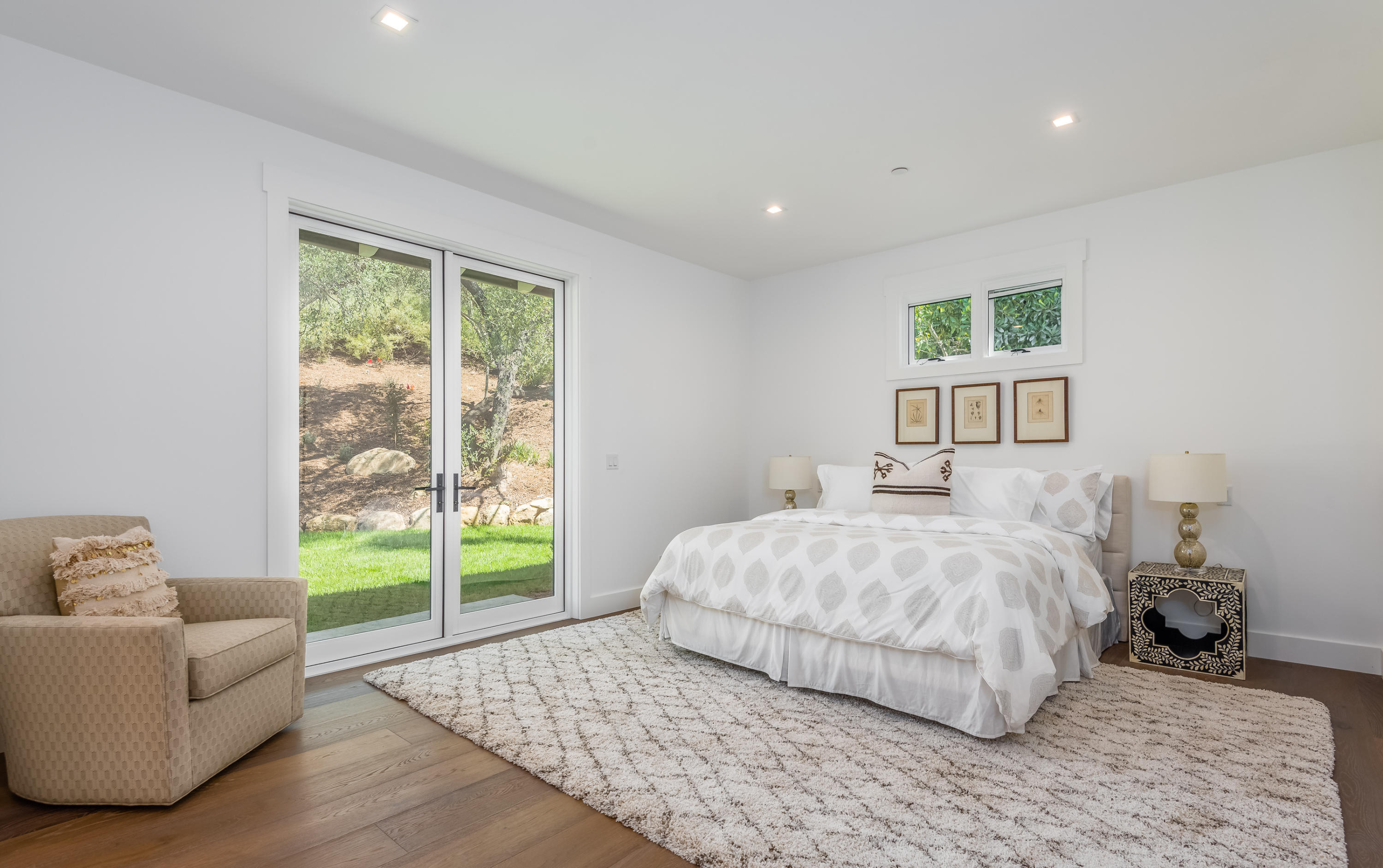 950 Brooktree Road Santa Barbara, CA 93108 - Photo 31 of 37 a bedroom with a large bed and a couch