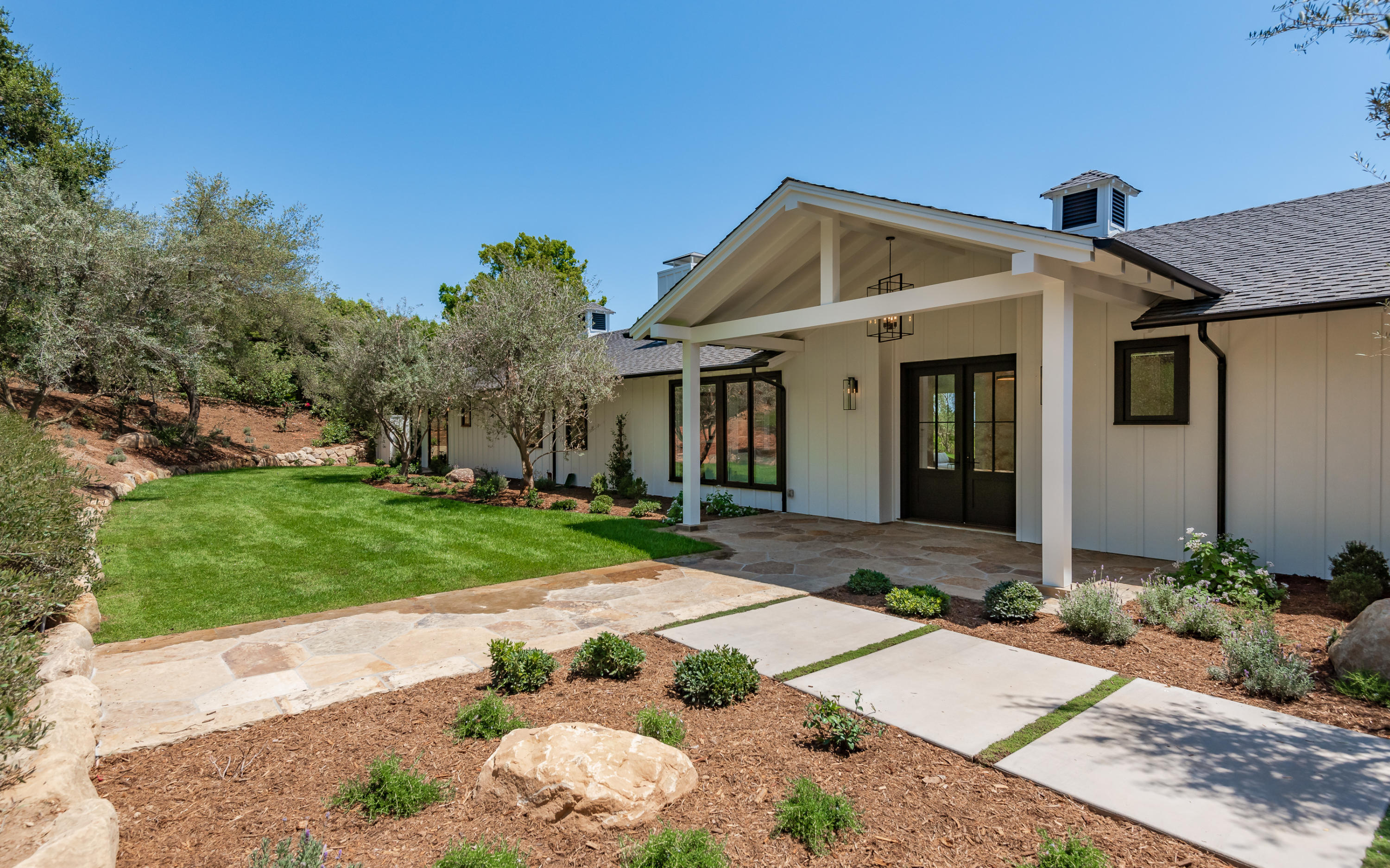 950 Brooktree Road Santa Barbara, CA 93108 - Photo 10 of 37 a front view of a house with garden