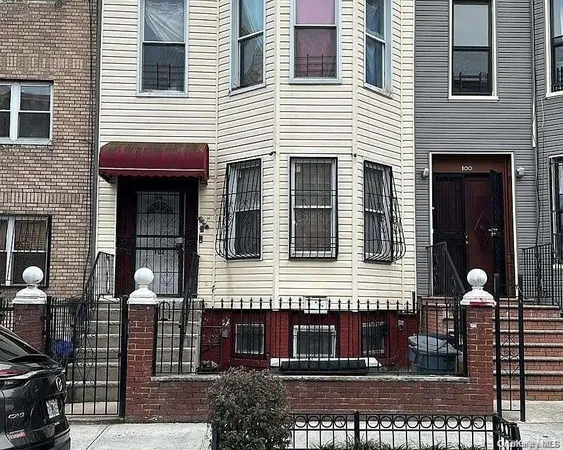 a front view of a house with balcony
