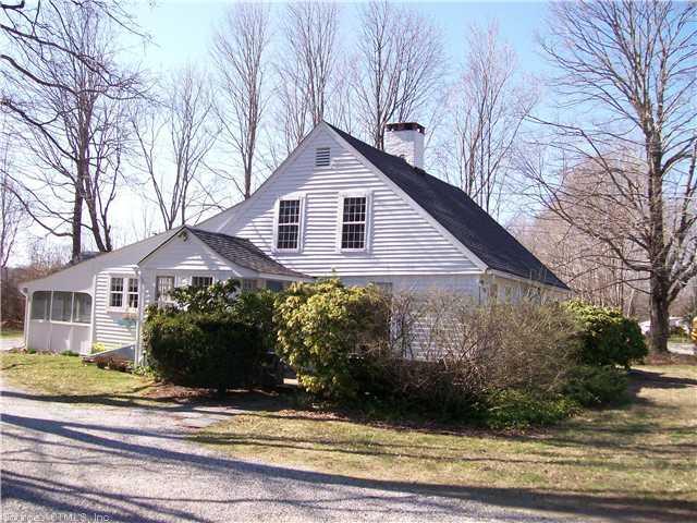 135 Glenwood Road Clinton, CT 06413 - Photo 1 of 1 a view of a house next to a yard