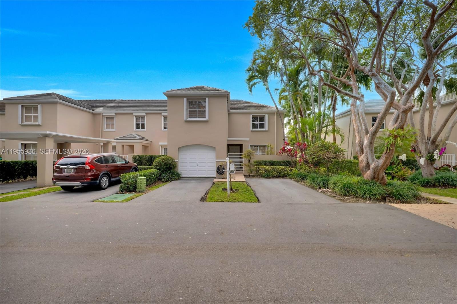 a view of a house with a street