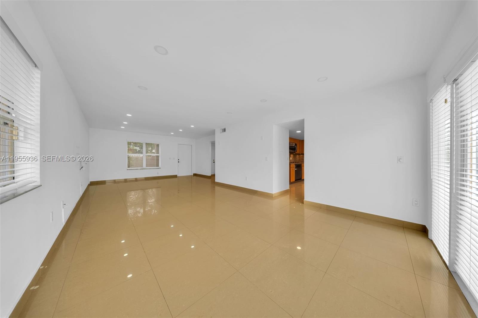 6960 Southwest 54th Street Miami, FL 33155 - Photo 13 of 55 a view of an empty room with a window