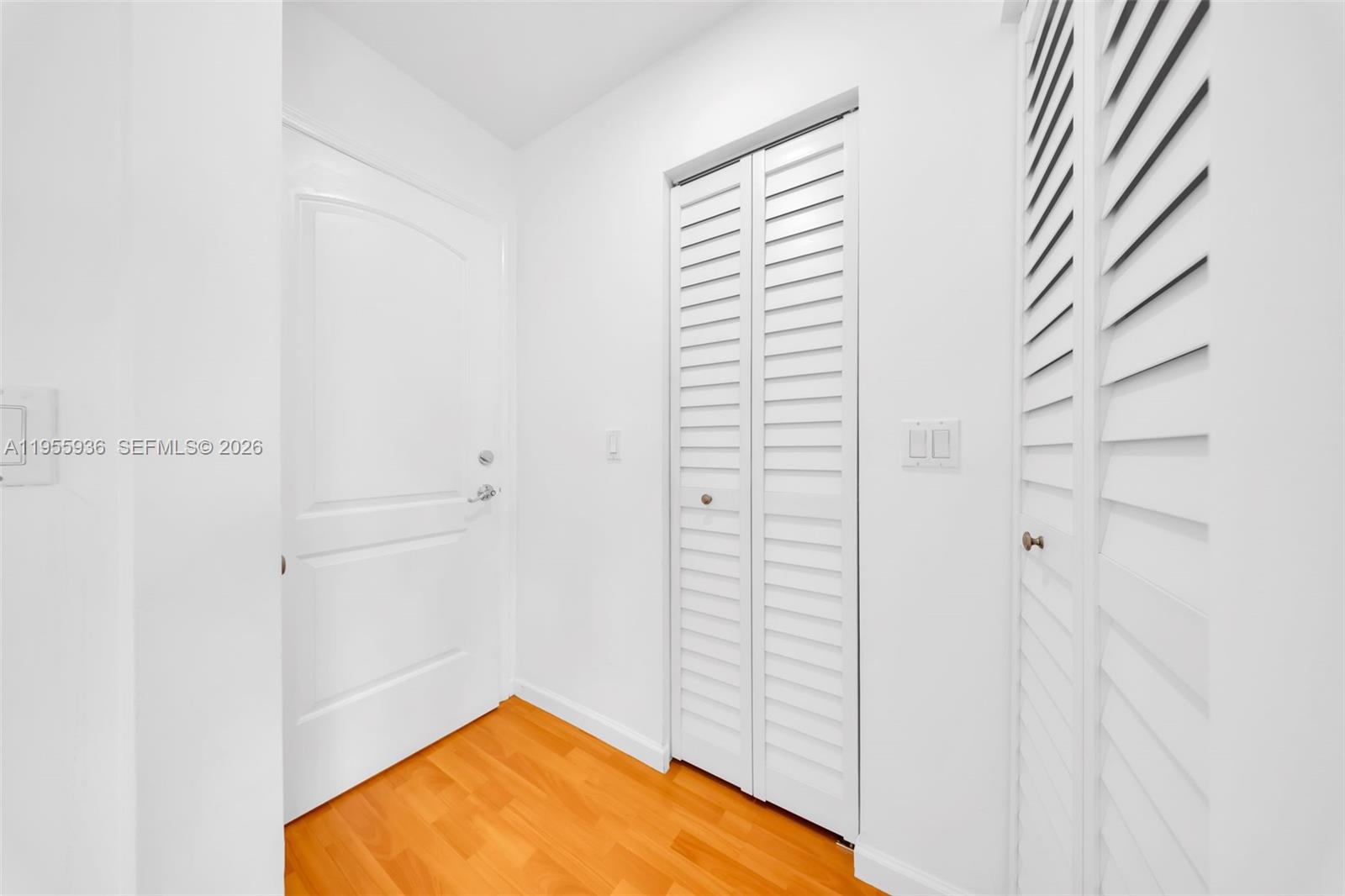 6960 Southwest 54th Street Miami, FL 33155 - Photo 44 of 55 a view of a room with white walls and a door