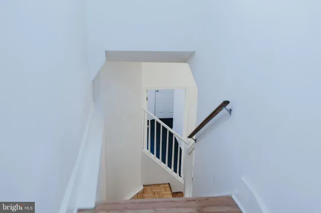 a view of entryway with wooden floor