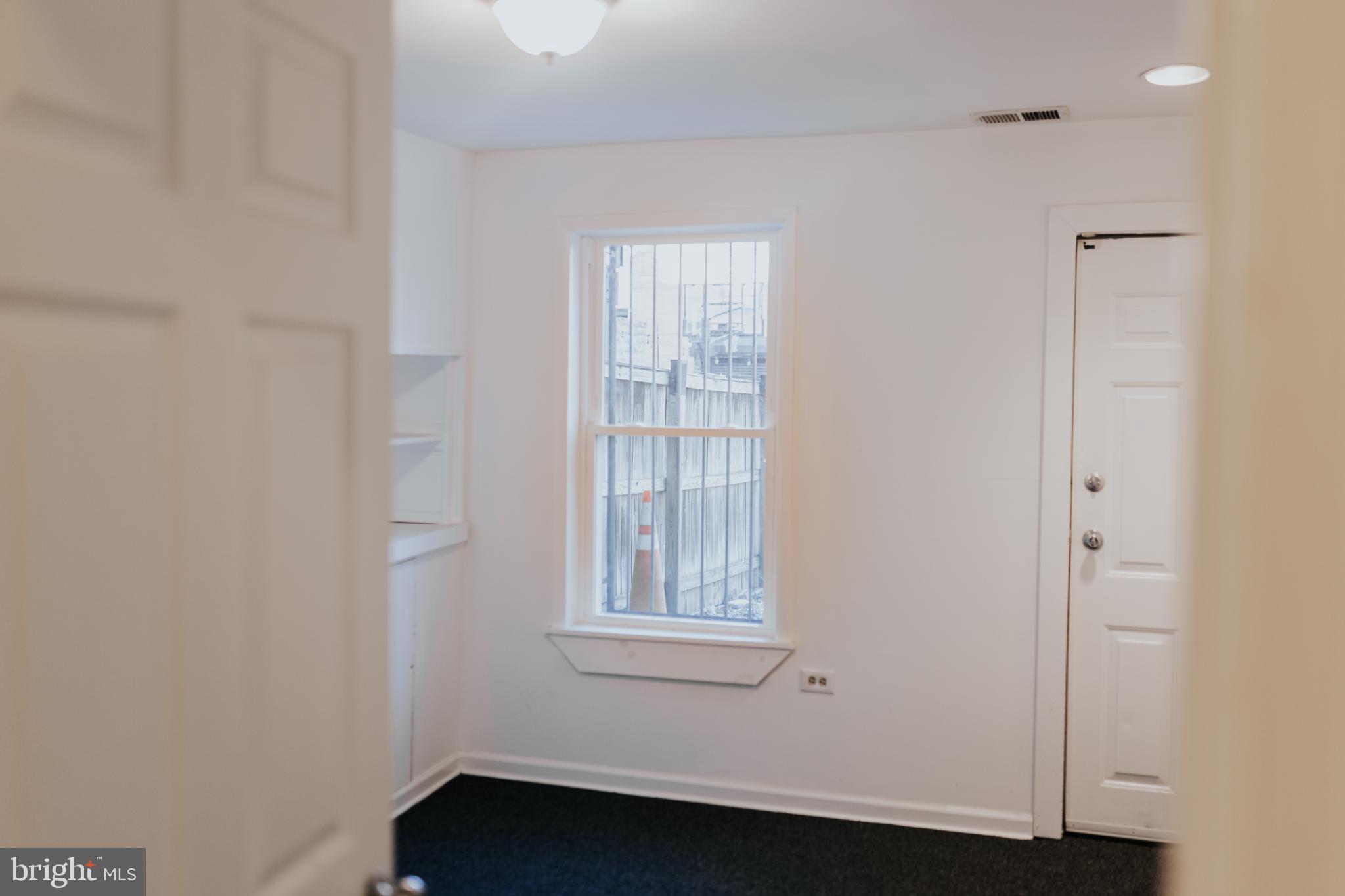2511 Madison Avenue, Unit 1 Baltimore, MD 21217 - Photo 15 of 23 a small space with a window
