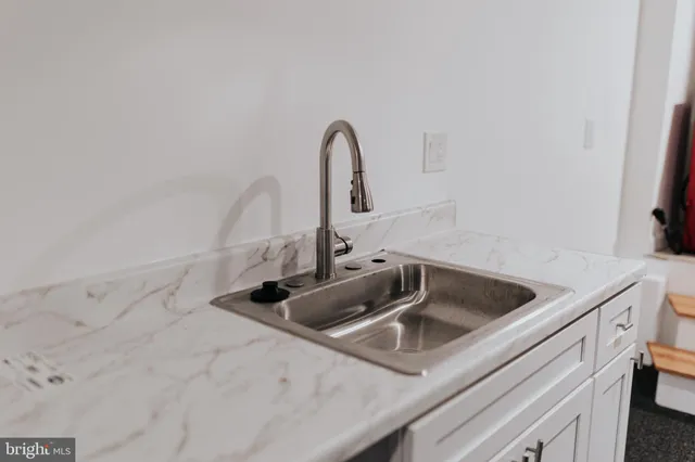 a close view of a sink and a vanity