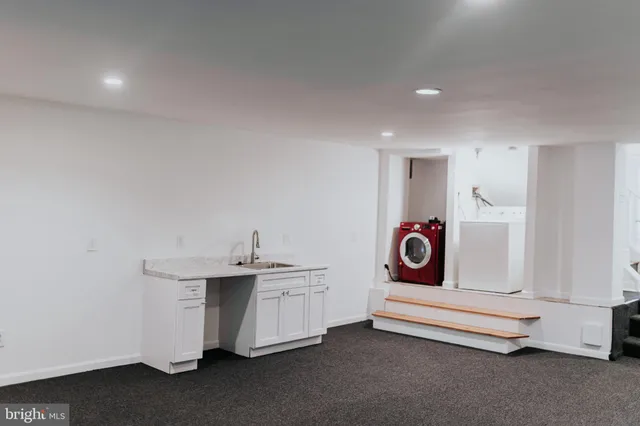 a utility room with a sink