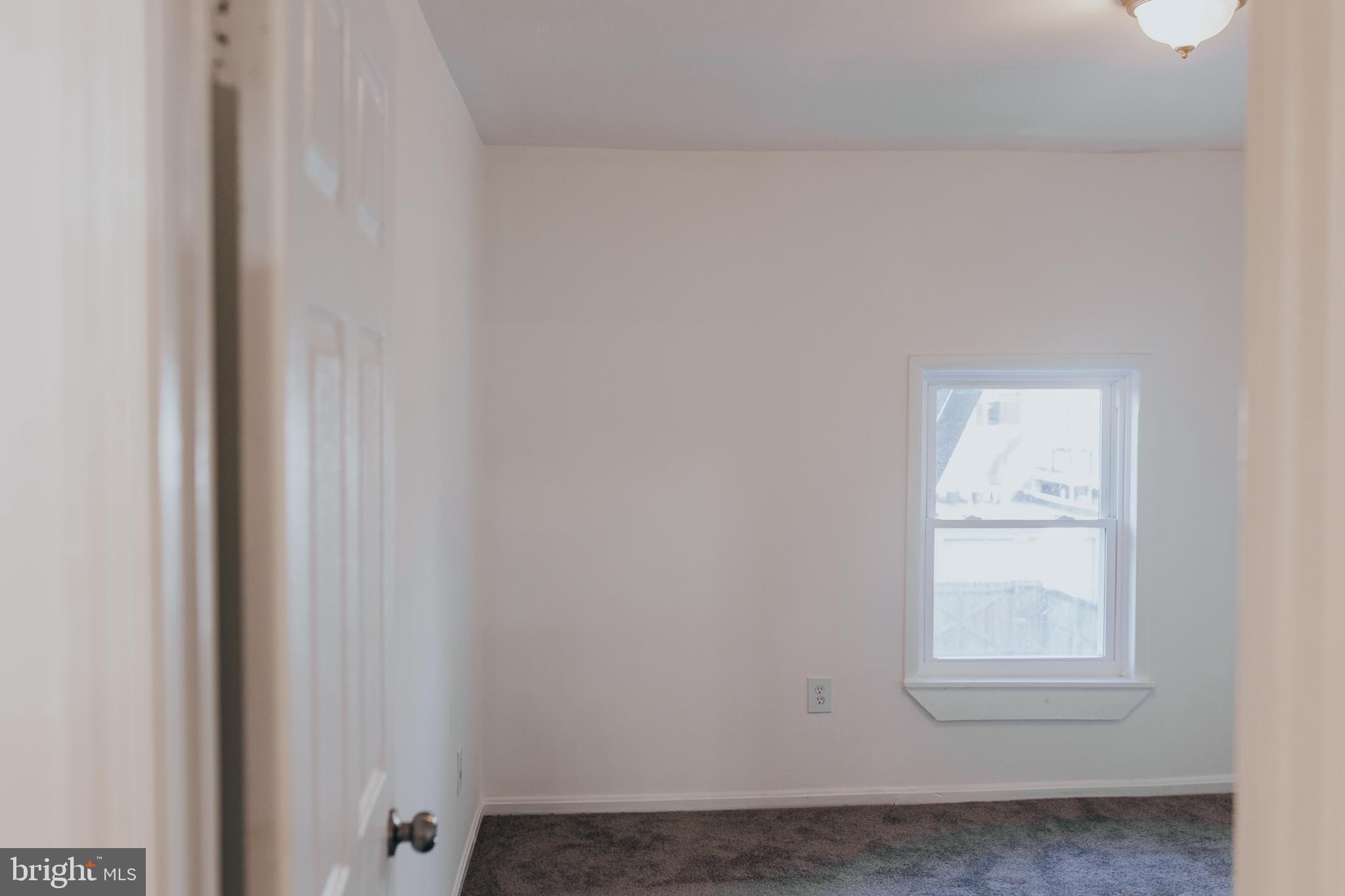 2511 Madison Avenue, Unit 1 Baltimore, MD 21217 - Photo 9 of 23 a view of a small space with window