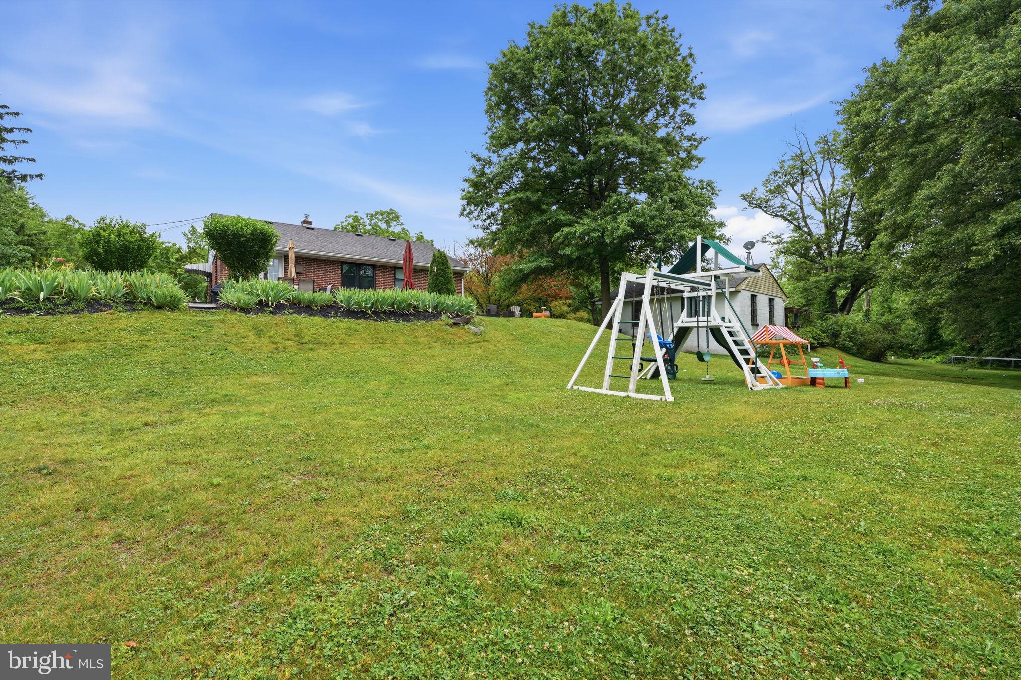 20 Poplar Road Ringoes, NJ 08551 - Photo 32 of 44 Spacious yard with playset and trees.