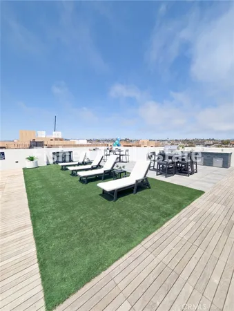 a view of a swimming pool with a yard