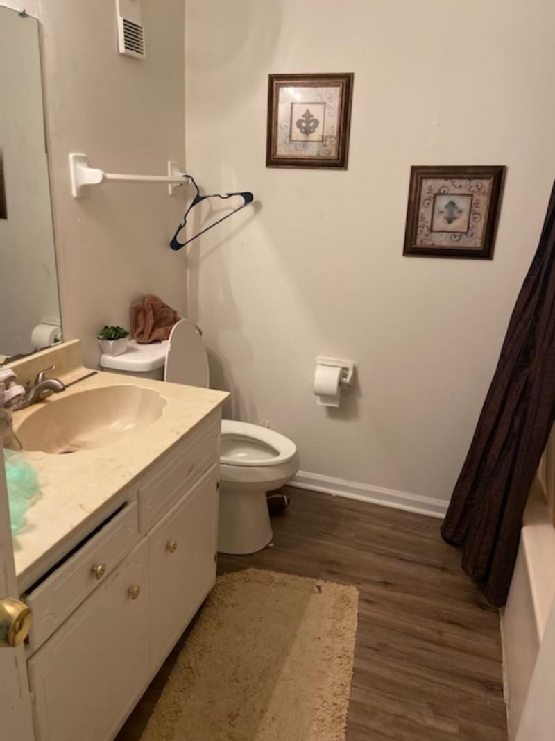 709 Eric Drive Nashville, TN 37207 - Photo 11 of 28 a bathroom with a granite countertop sink mirror vanity and toilet