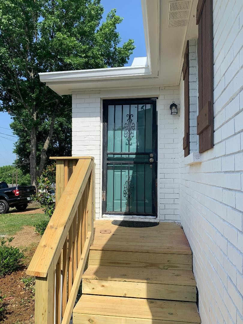 709 Eric Drive Nashville, TN 37207 - Photo 14 of 28 a view of a house with backyard and deck