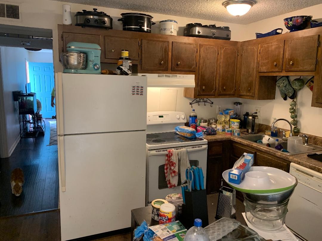 709 Eric Drive Nashville, TN 37207 - Photo 16 of 28 a kitchen with a refrigerator and a stove top oven