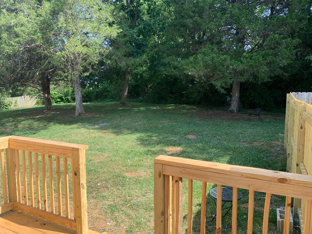 709 Eric Drive Nashville, TN 37207 - Photo 4 of 28 a view of a backyard with a garden
