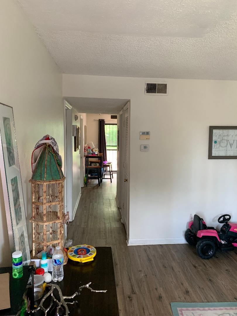 709 Eric Drive Nashville, TN 37207 - Photo 9 of 28 a living room with furniture and a wooden floor