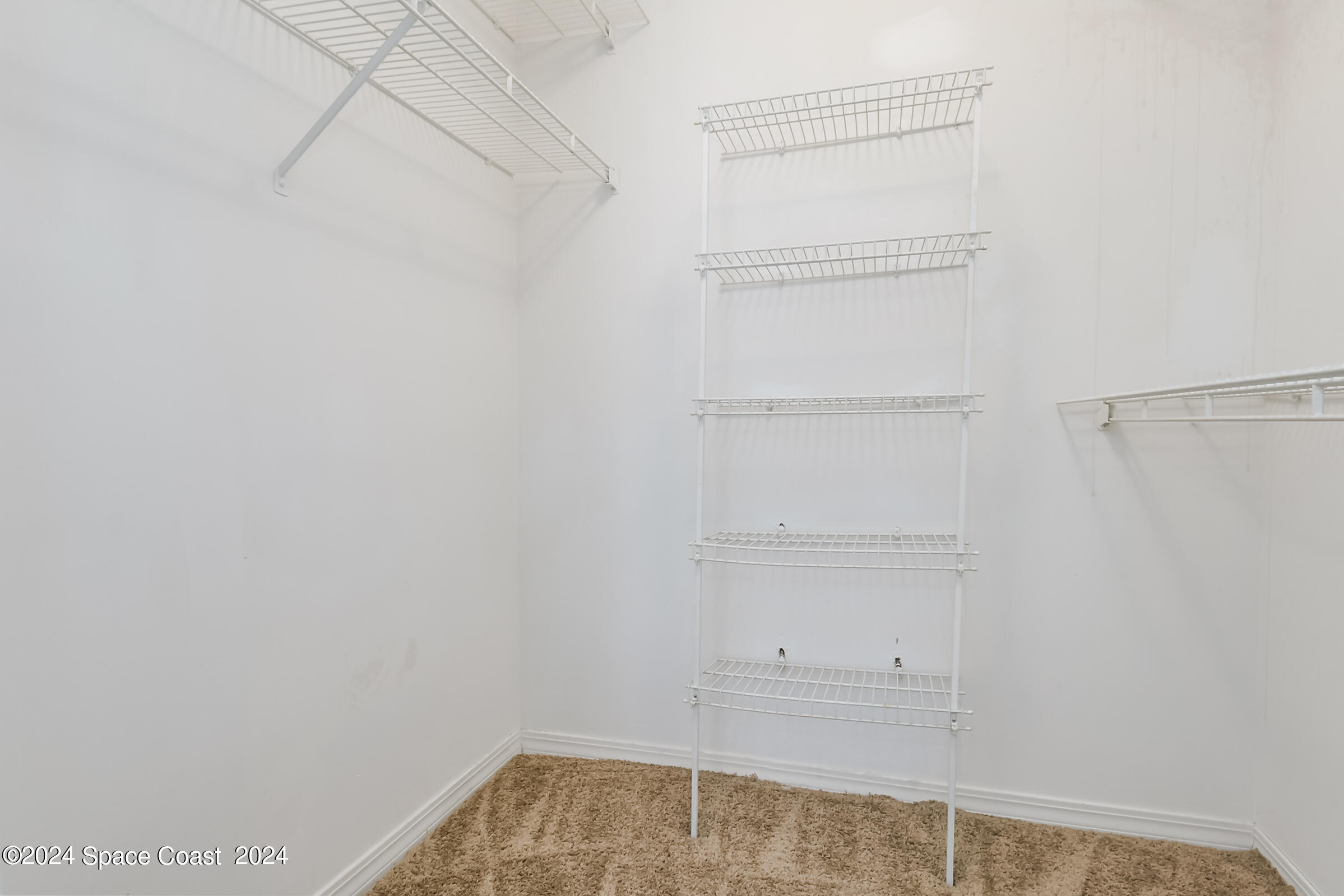 7667 North Wickham Road, Unit 1511 Melbourne, FL 32940 - Photo 13 of 39 2nd Walk In Closet