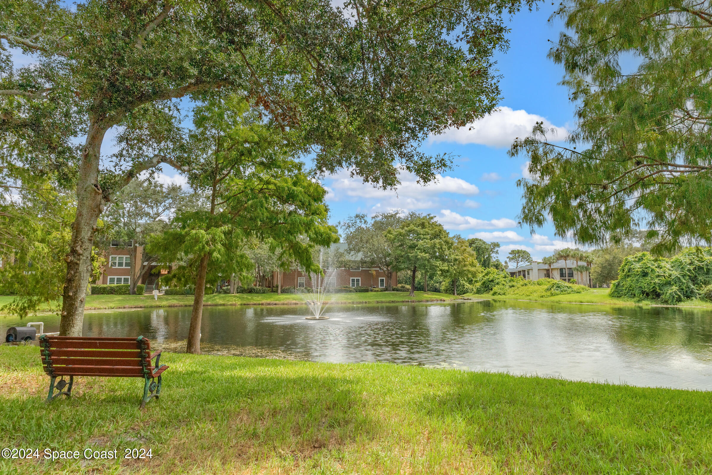 7667 North Wickham Road, Unit 1511 Melbourne, FL 32940 - Photo 20 of 39 Community Lake