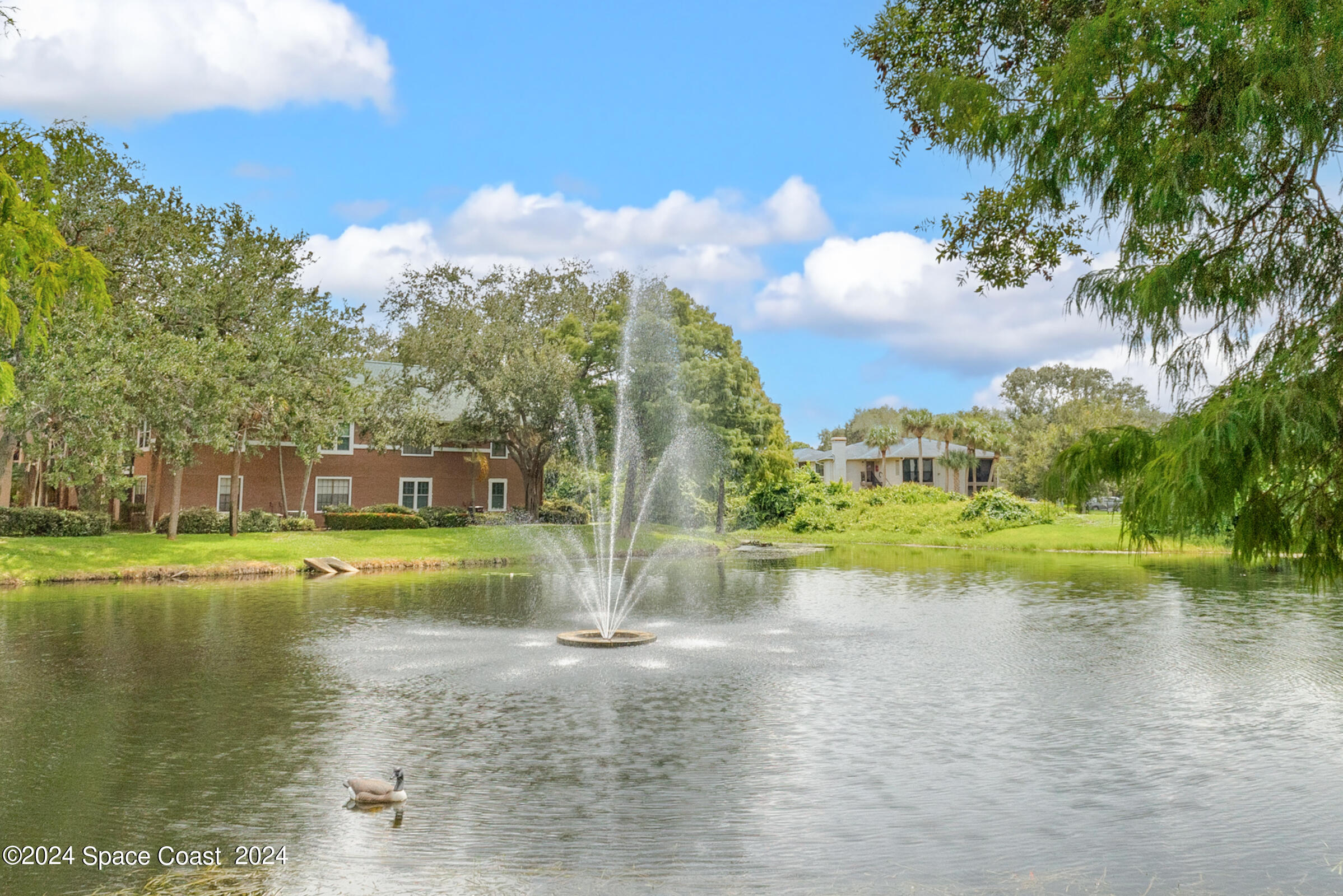 7667 North Wickham Road, Unit 1511 Melbourne, FL 32940 - Photo 26 of 39 Community Lake