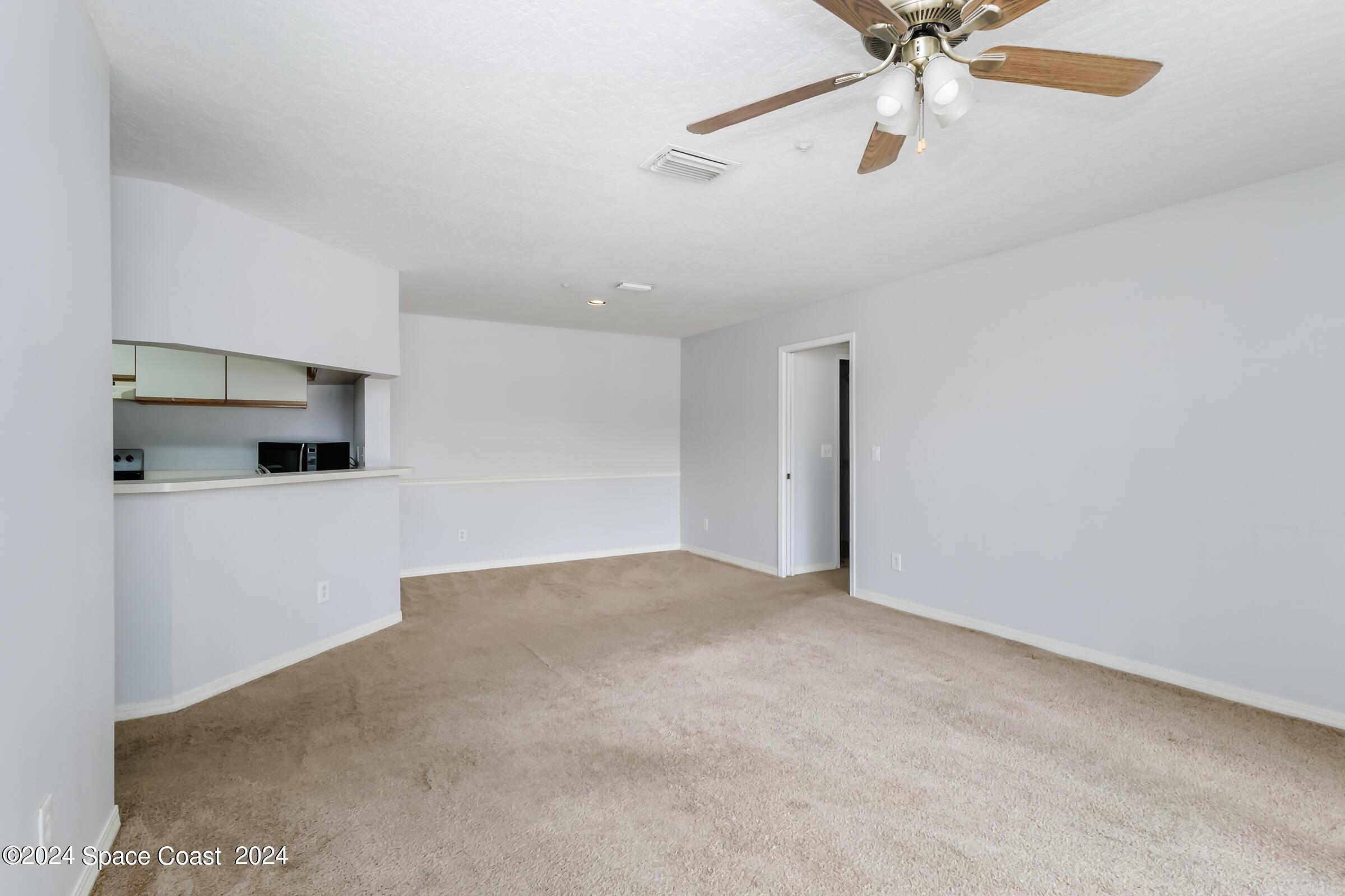 7667 North Wickham Road, Unit 1511 Melbourne, FL 32940 - Photo 6 of 39 Living/Dining