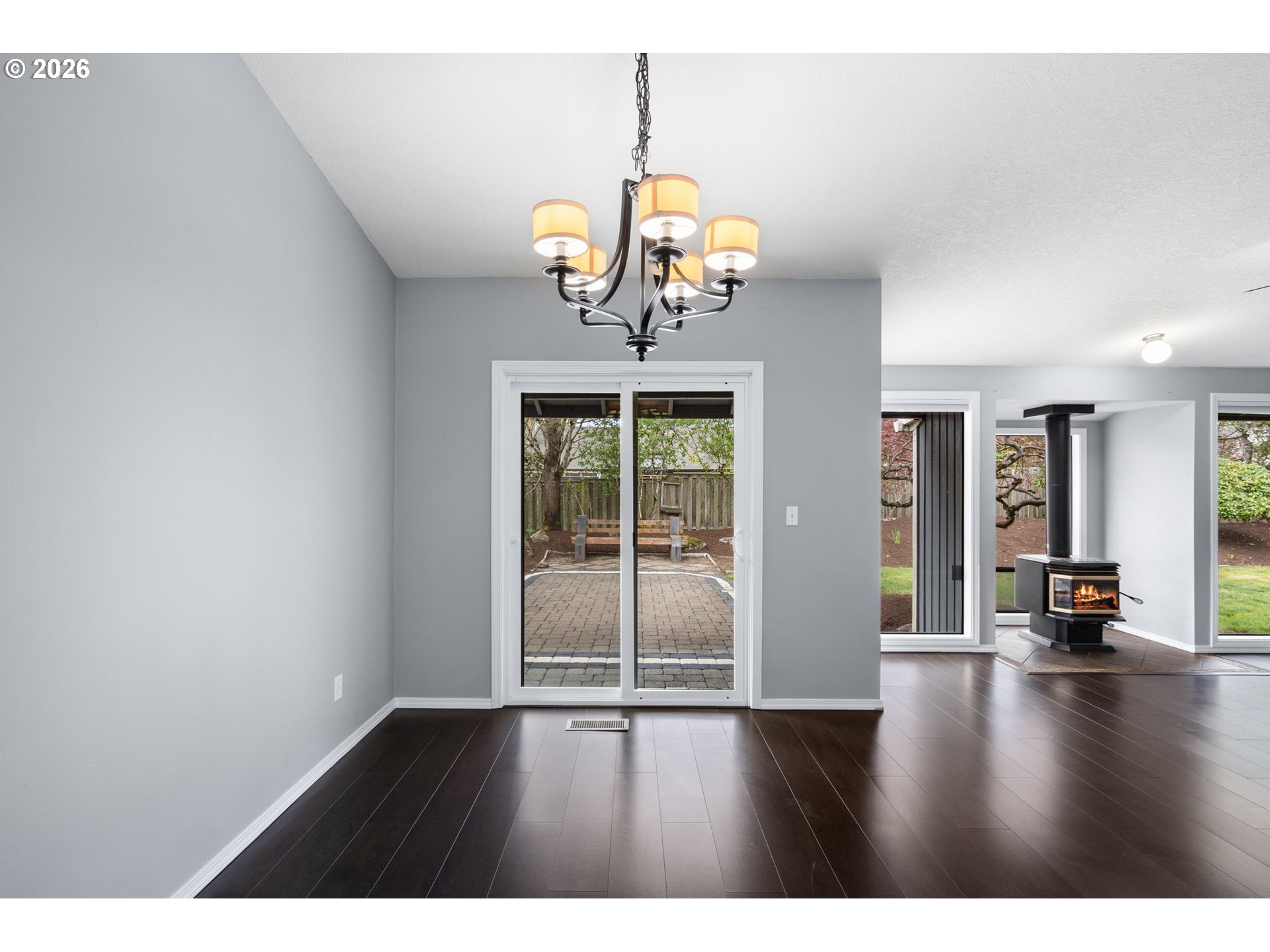 895 Southwest 166th Avenue Beaverton, OR 97006 - Photo 13 of 36 a view of an empty room with window and wooden floor