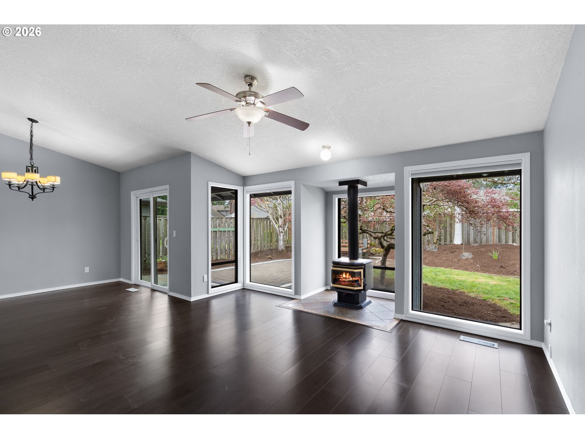 895 Southwest 166th Avenue Beaverton, OR 97006 - Photo 17 of 36 a view of an empty room with wooden floor and a window