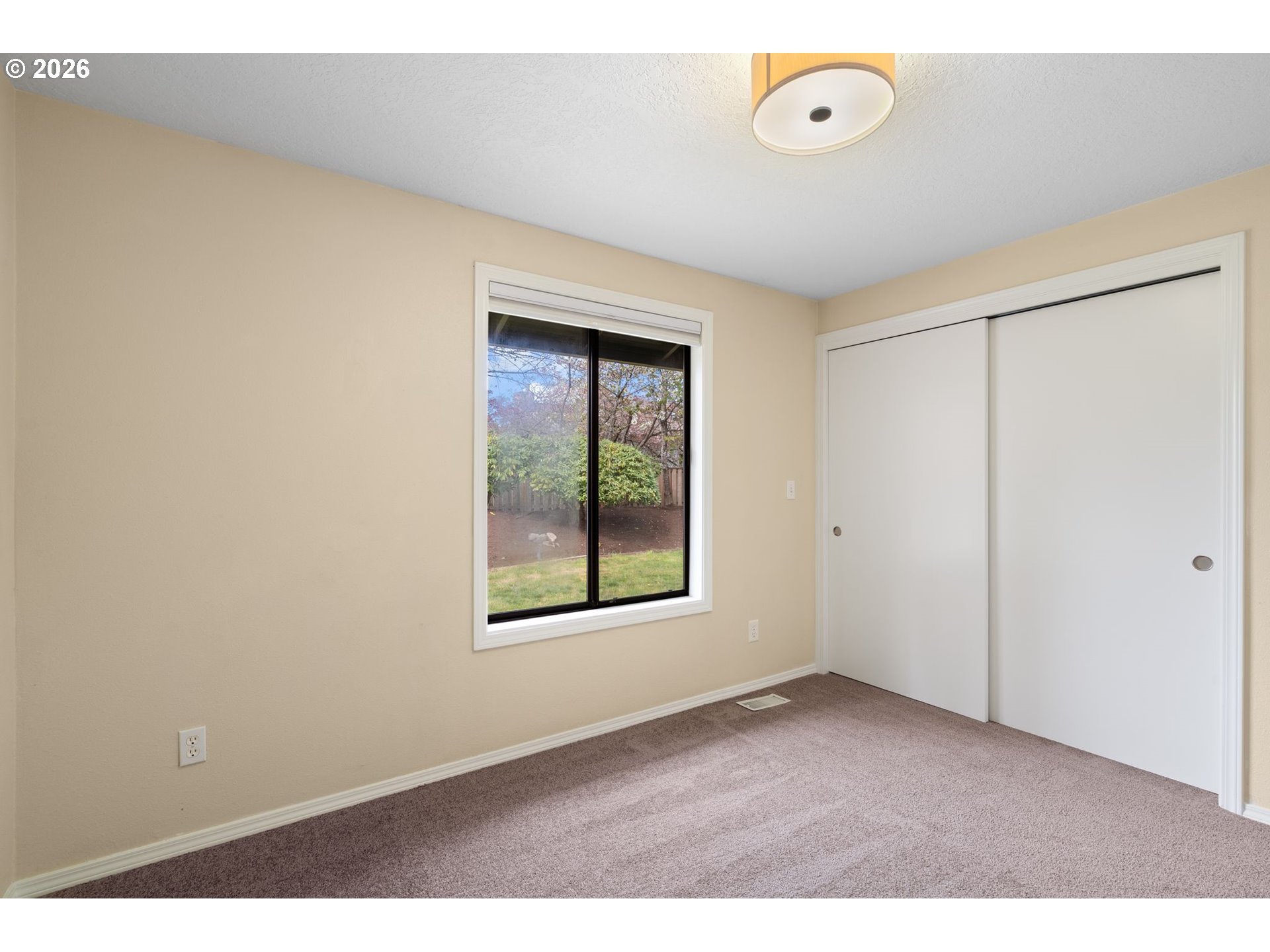 895 Southwest 166th Avenue Beaverton, OR 97006 - Photo 28 of 36 a view of an empty room with a window
