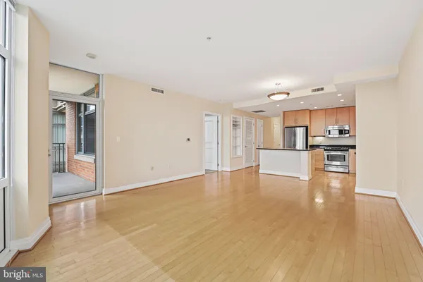 a view of kitchen with wooden floor