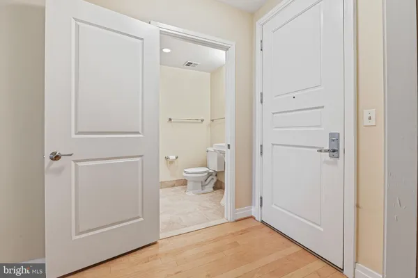 a view of bathroom with a toilet