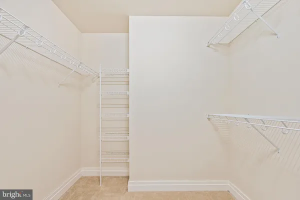 a view of small space with racks on the wall