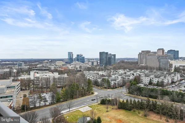 a view of a city with tall buildings