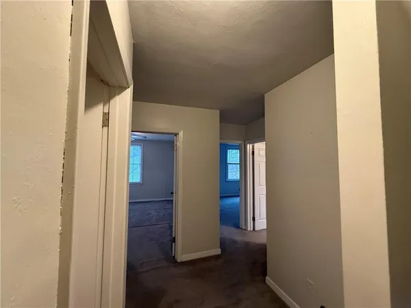 a view of hallway with stairs