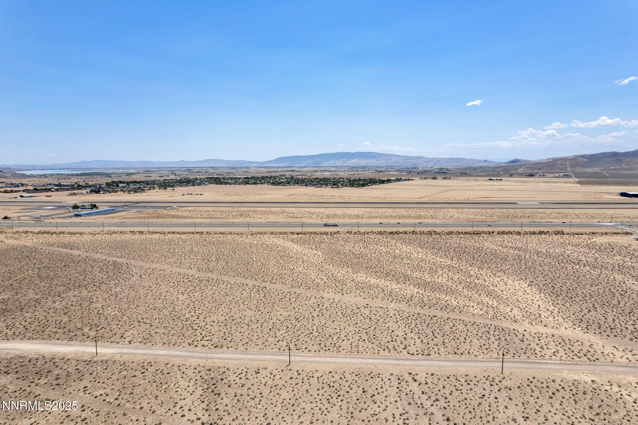2215 Comstock Street Silver Springs, NV 89429 - Photo 2 of 8 a view of an ocean and beach