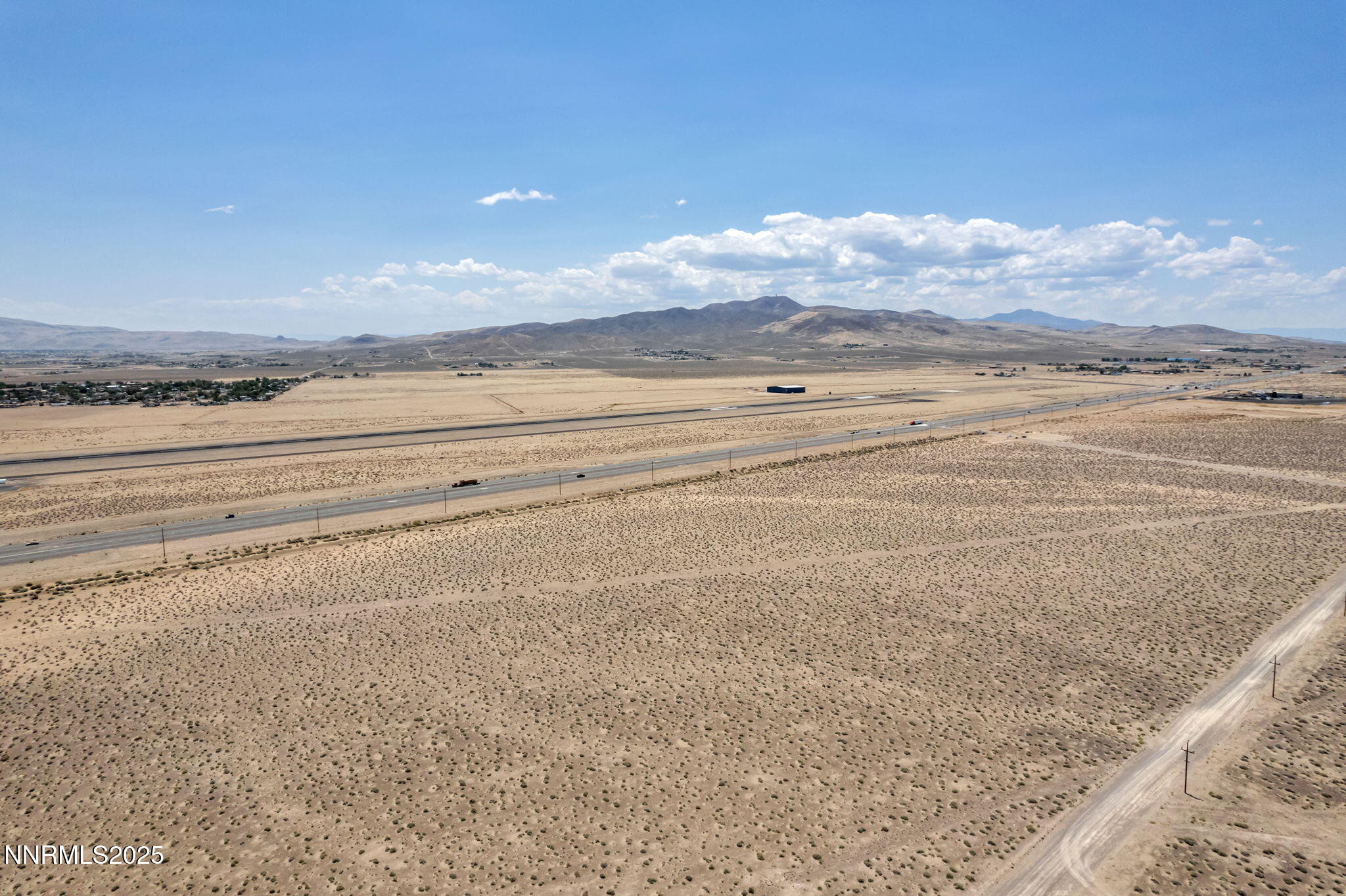 2215 Comstock Street Silver Springs, NV 89429 - Photo 3 of 8 a view of an ocean and mountain
