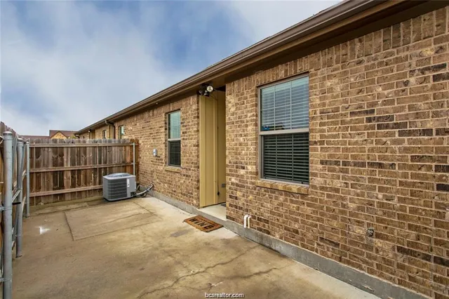 a view of a house with a large window