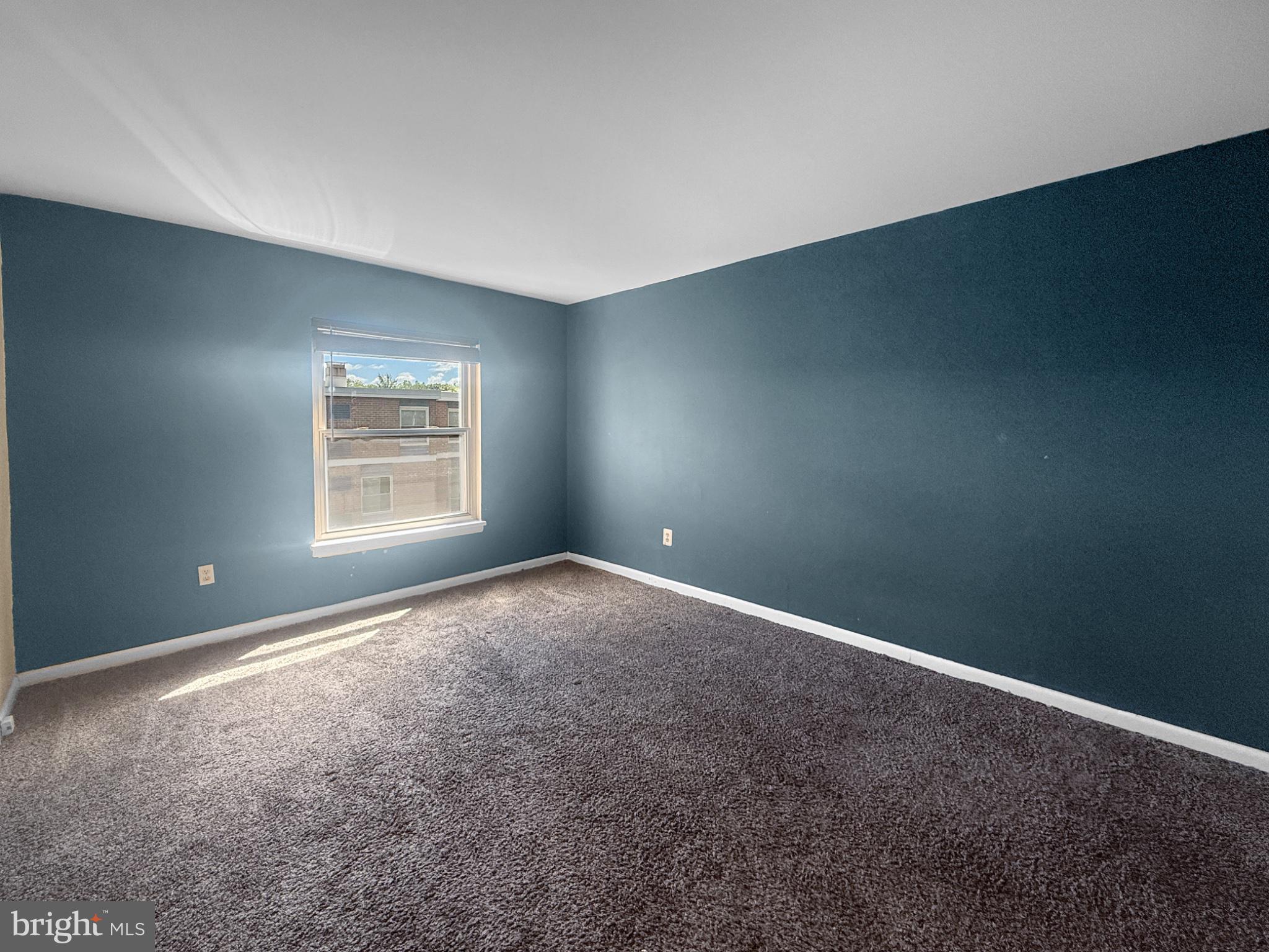 3807 St Barnabas Road, Unit 203 Suitland, MD 20746 - Photo 15 of 23 Serene blue walls invite creativity.