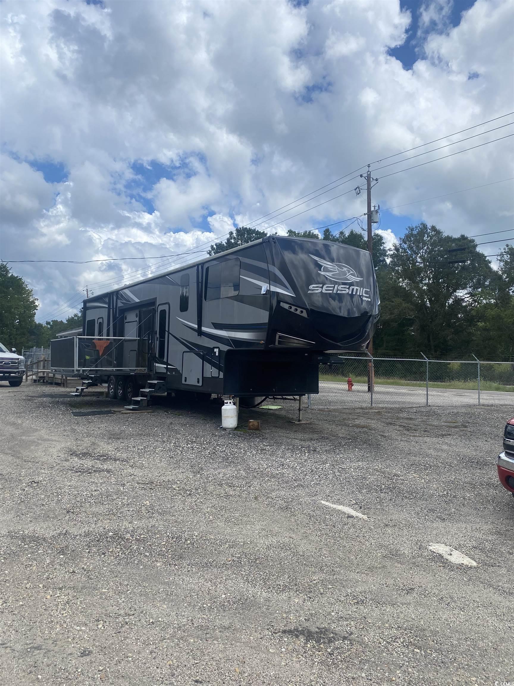 2433 Old Corner Court Marion, SC 29571 - Photo 16 of 18 View of uncovered parking lot