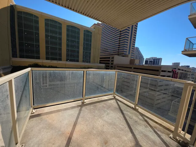 a view of a balcony with double door