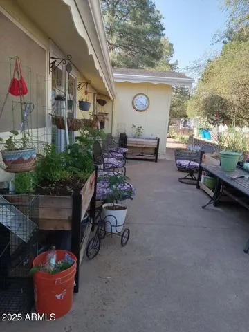 a view of a chairs and tables in patio
