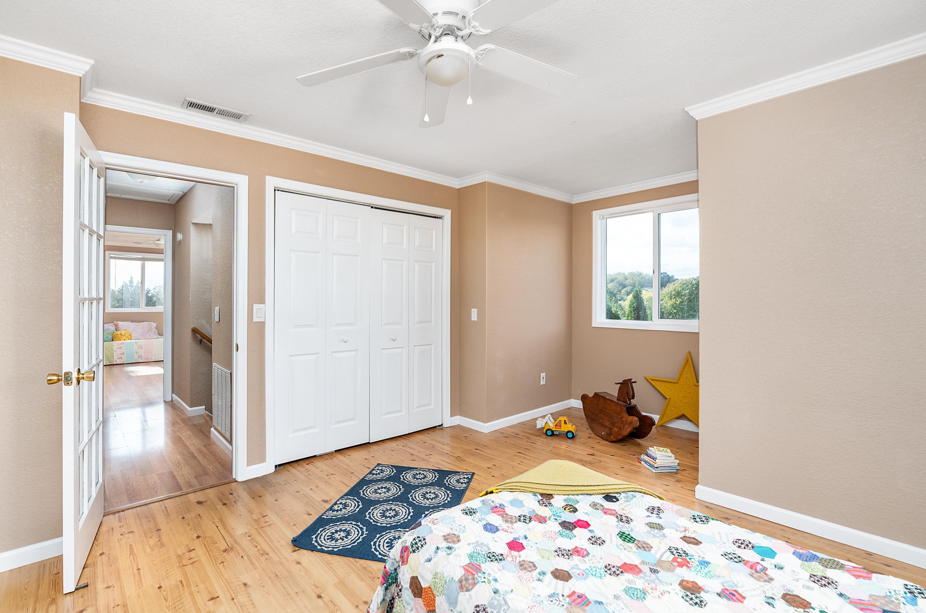3111 Oak Ridge Road Mount Crawford, VA 22841 - Photo 31 of 50 a bedroom with a bed and wooden floor